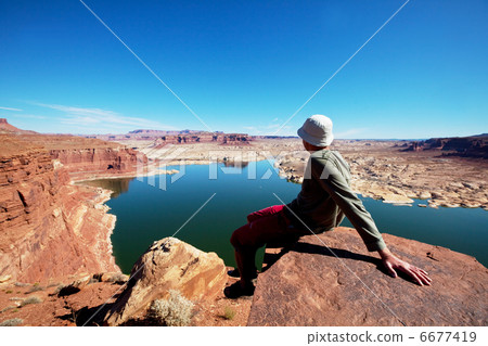 Man on the cliff 6677419