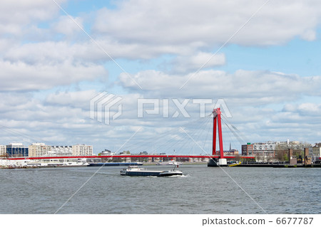 Red suspension bridge over  Maas in Rotterdam. Netherlands 6677787