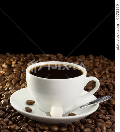 cup of coffee on beans cup of coffee on beans 6678359