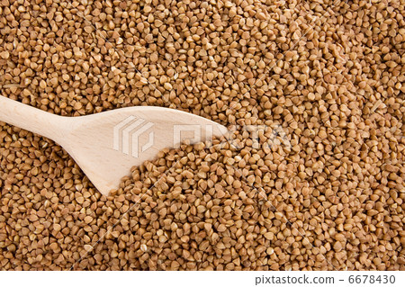 buckwheat seed and wood spoon 6678430