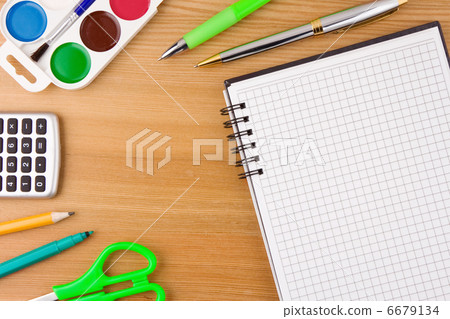school accessories and notebook on wood table 6679134
