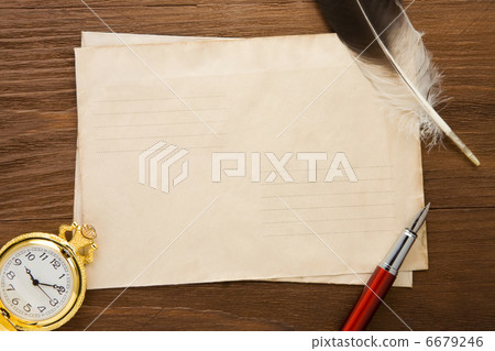 watch and ink pen at envelope 6679246