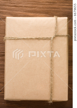 parcel wrapped packaged box on wood parcel wrapped packaged box on wood 6679655