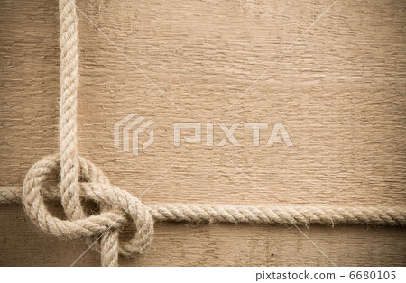 ship ropes on wood background 6680105