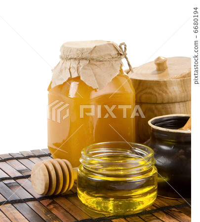 honey and jars isolated on white honey and jars isolated on white 6680194