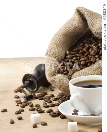 cup of coffee and grinder cup of coffee and grinder 6680249