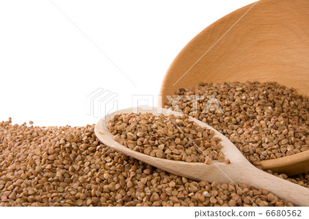 buckwheat and wood spoon isolated on white 6680562