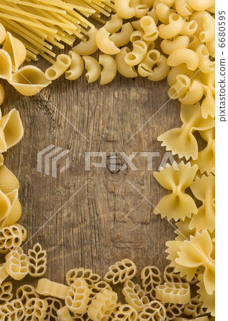 raw pasta on wood raw pasta on wood 6680595