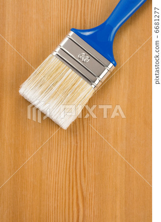 paintbrush on wood background 6681277
