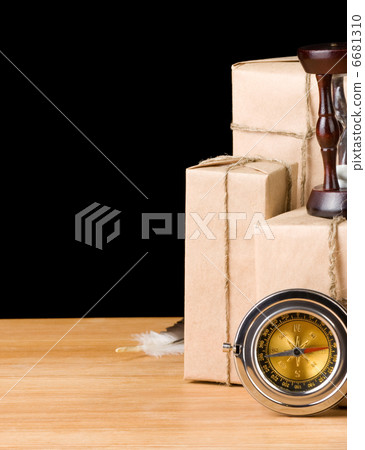 parcel wrapped packaged box isolated on black 6681310