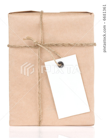 paper parcel wrapped tied with price tag 6681361