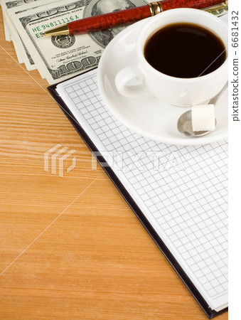 cup of coffee and notebook with dollar cup of coffee and notebook with dollar 6681432