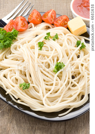 pasta in plate on wood 6681638
