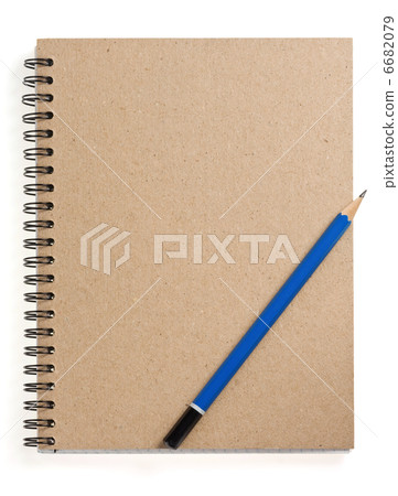 pencil on checked notebook at white pencil on checked notebook at white 6682079