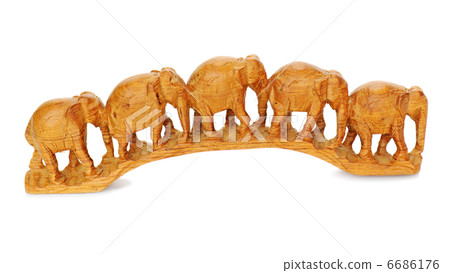 five wooden elephants walking together isolated on white background 6686176
