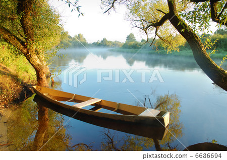 Beautiful river and yellow boat 6686694