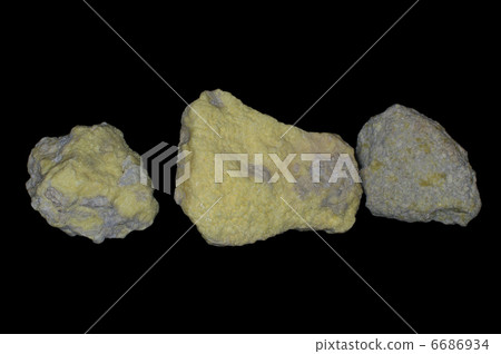 Sulphur crystals isolated on black. 6686934