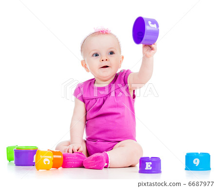 baby girl playing toys 6687977