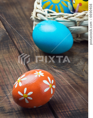 Painted Easter eggs in a basket Painted Easter eggs in a basket 6690408
