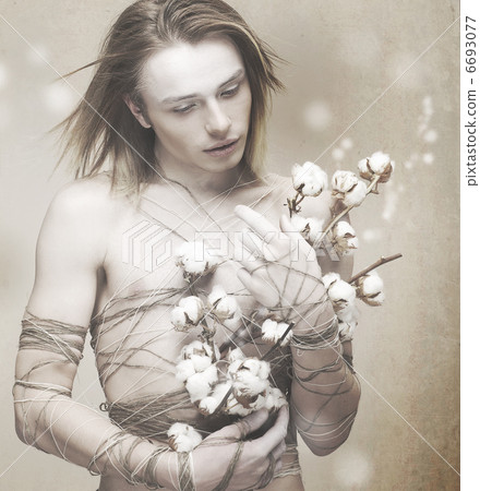 Blossom. Stylish Dandy with Flowers over Blurred Background. Delight 6693077