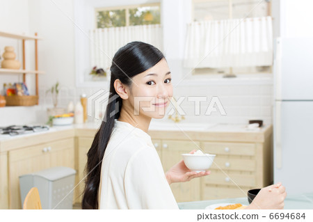 A lady in a meal A lady in a meal 6694684