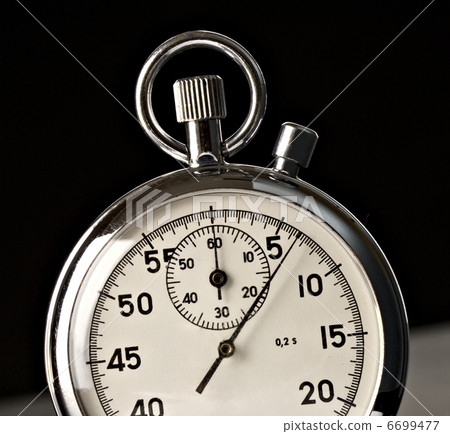 Stopwatch isolated on the black background Stopwatch isolated on the black background 6699477