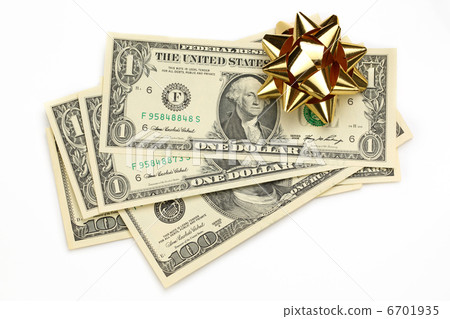Dollars with decorative bow on white Dollars with decorative bow on white 6701935