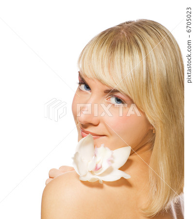 Beautiful blond girl with orchid flower isolated on white backgr Beautiful blond girl with orchid flower isolated on white backgr 6705023
