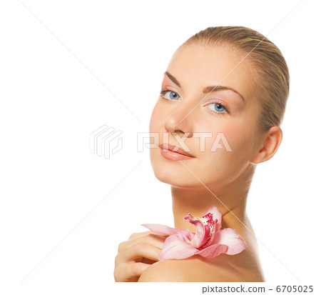Beautiful blond girl with orchid flower isolated on white backgr Beautiful blond girl with orchid flower isolated on white backgr 6705025
