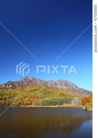 Tottake mountain and mirror pond in autumn 6705605