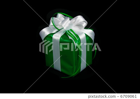 green gift box on black green gift box on black 6709061