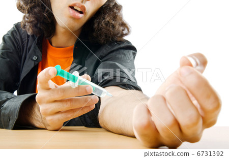 Drug addict during injection Drug addict during injection 6731392