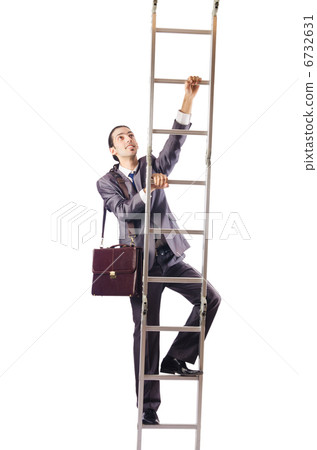 Businessman climbing the ladder isolated on white Businessman climbing the ladder isolated on white 6732631