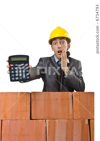Businessman with bricks on white Businessman with bricks on white 6734793