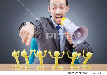 Boss with figures of his subordinates Boss with figures of his subordinates 6735433