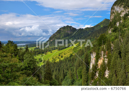 Green meadow among mountains in Bavaria, Germany. 6750766