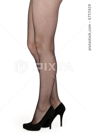 Beautiful female legs in pantyhose and shoes with heels Beautiful female legs in pantyhose and shoes with heels 6755929