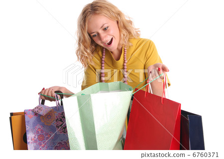 Beautiful woman with surprise looks in a bag 6760371