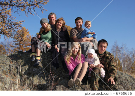 Big happy family in autumn park Big happy family in autumn park 6760656