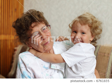 Happy prograndmother with the granddaughter 6761835