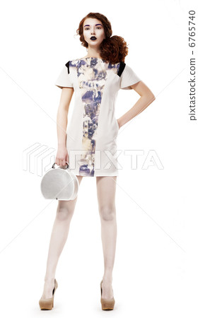 Pretty Stylish Woman in Urban Costume. Elegance. Trendy Collection 6765740