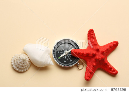 Compass, red seastar and seashells Compass, red seastar and seashells 6768896
