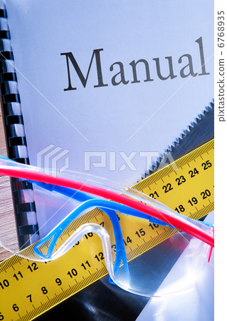 Ruler, manual, handsaw and goggles Ruler, manual, handsaw and goggles 6768935