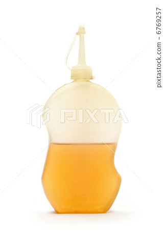 Lube in plastic bottle on white Lube in plastic bottle on white 6769257