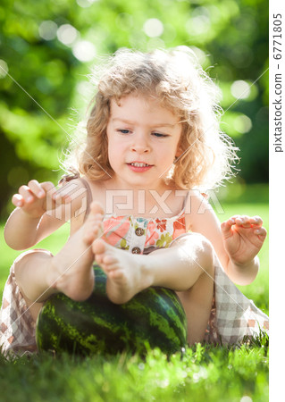 Child playing with watermelon Child playing with watermelon 6771805