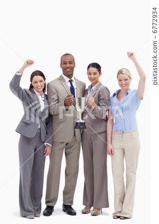 Happy business team holding a cup 6772934