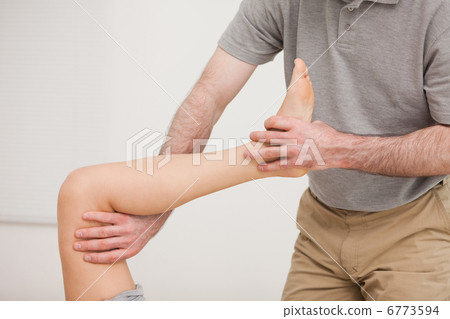 Leg of a patient being stretched 6773594