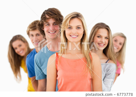Group standing behind one another at varied angles 6773778