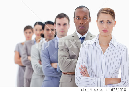 Close-up of serious people dressed in suits crossing their arms Close-up of serious people dressed in suits crossing their arms 6774610