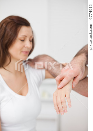 Peaceful patient being examined by a doctor Peaceful patient being examined by a doctor 6774913